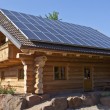 Blockbohlenhaus mit Photovoltaik